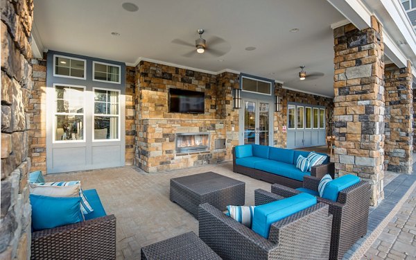 Chic outdoor patio with modern seating at Element Ballantyne Apartments