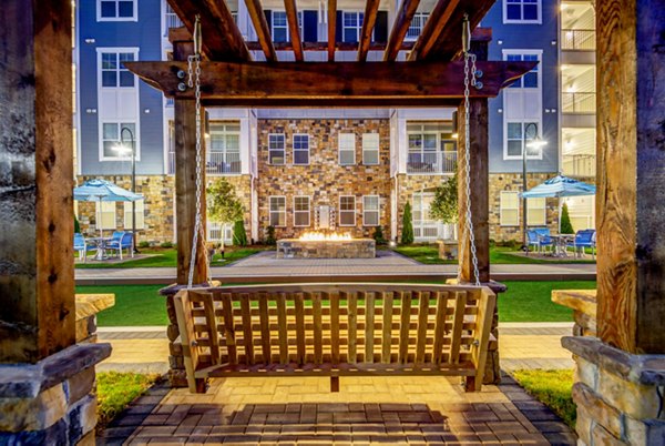 fire pit at Element Ballantyne Apartments
