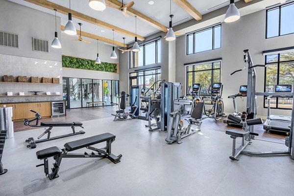 State-of-the-art fitness center at Novel River Oaks Apartments with modern exercise equipment