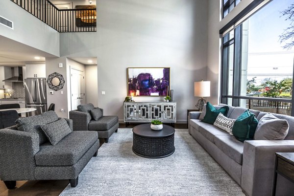 Spacious modern living room with stylish decor at Novel River Oaks Apartments, ideal for luxury living