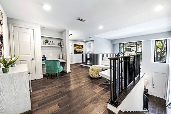 upstairs living room/office at Novel River Oaks Apartments