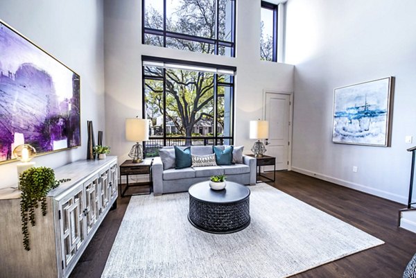 Living room entrance with modern decor at Novel River Oaks Apartments
