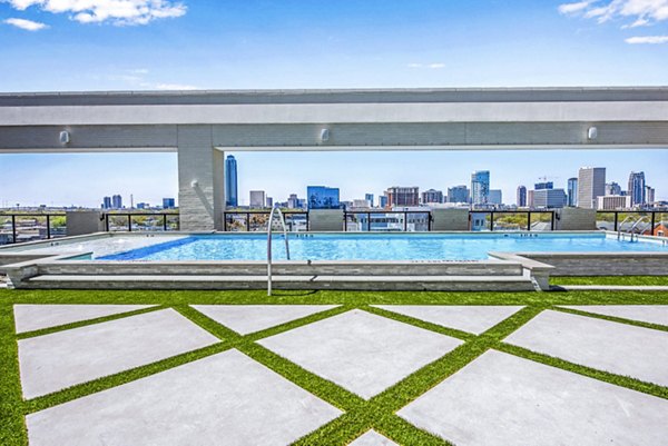 Luxurious pool at Novel River Oaks Apartments offering resort-style relaxation and modern conveniences in the heart of River Oaks