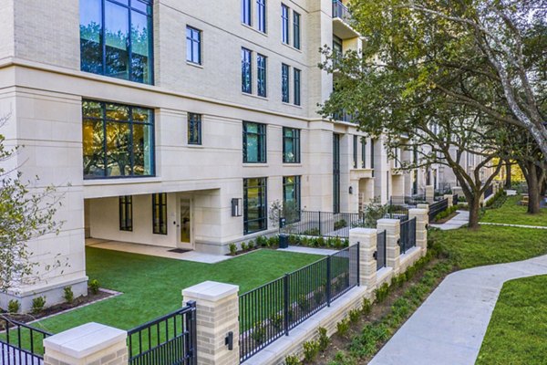 Fully fenced dog park at Novel River Oaks Apartments, perfect for pet-friendly leisure in a vibrant community