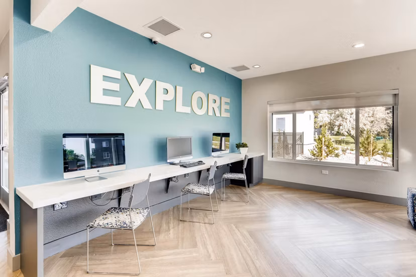 The Lodge Apartment Homes: Elegant clubhouse with modern decor and comfortable seating areas for residents