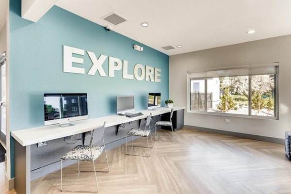 The Lodge Apartment Homes: Elegant clubhouse with modern decor and comfortable seating areas for residents