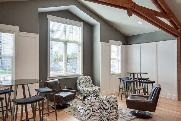 Modern clubhouse with stylish seating at The Bailey at Amazon Creek Apartments