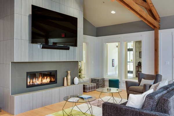 Clubhouse featuring modern design and cozy seating at The Bailey at Amazon Creek Apartments