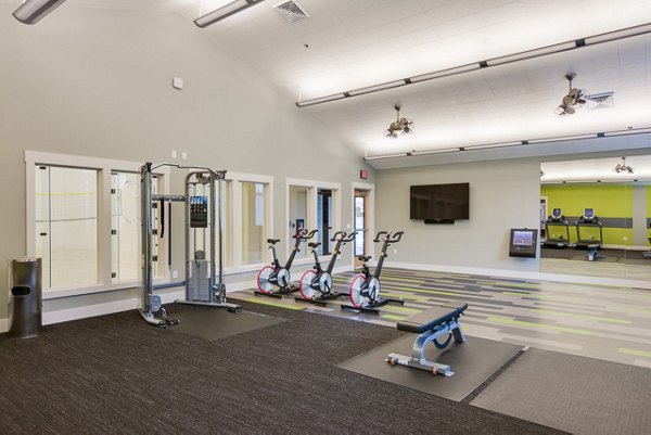 Modern fitness room with state-of-the-art equipment at The Bailey at Amazon Creek Apartments