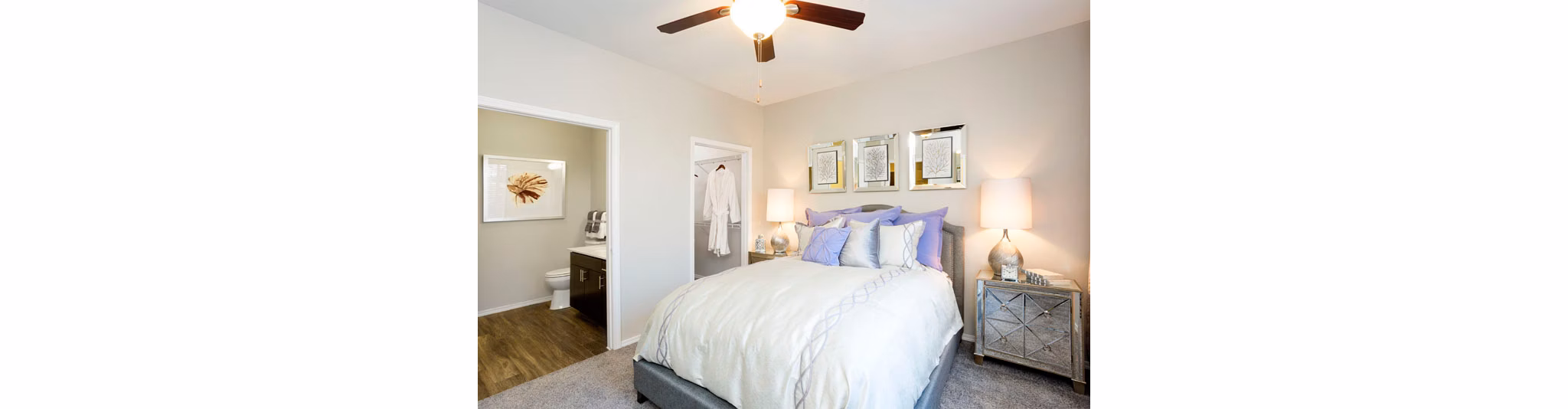 Spacious bedroom with modern decor at Aspen Ridge Apartments, featuring luxury amenities and comfortable living spaces