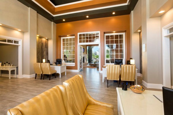 Clubhouse with cozy seating and fireplace at Aspen Ridge Apartments, perfect for relaxation and social gatherings in a luxury community