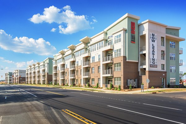 13064 floor plan at M Station Apartments: Modern layout featuring open-concept design and spacious living areas