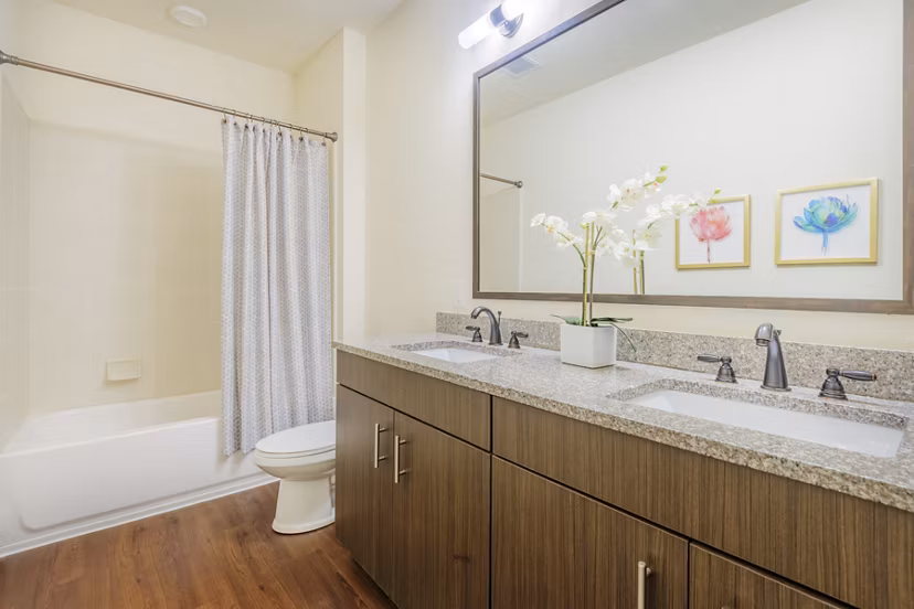 13064BTH1 floor plan showcasing modern design and efficient layout at M Station Apartments, optimizing luxury living space