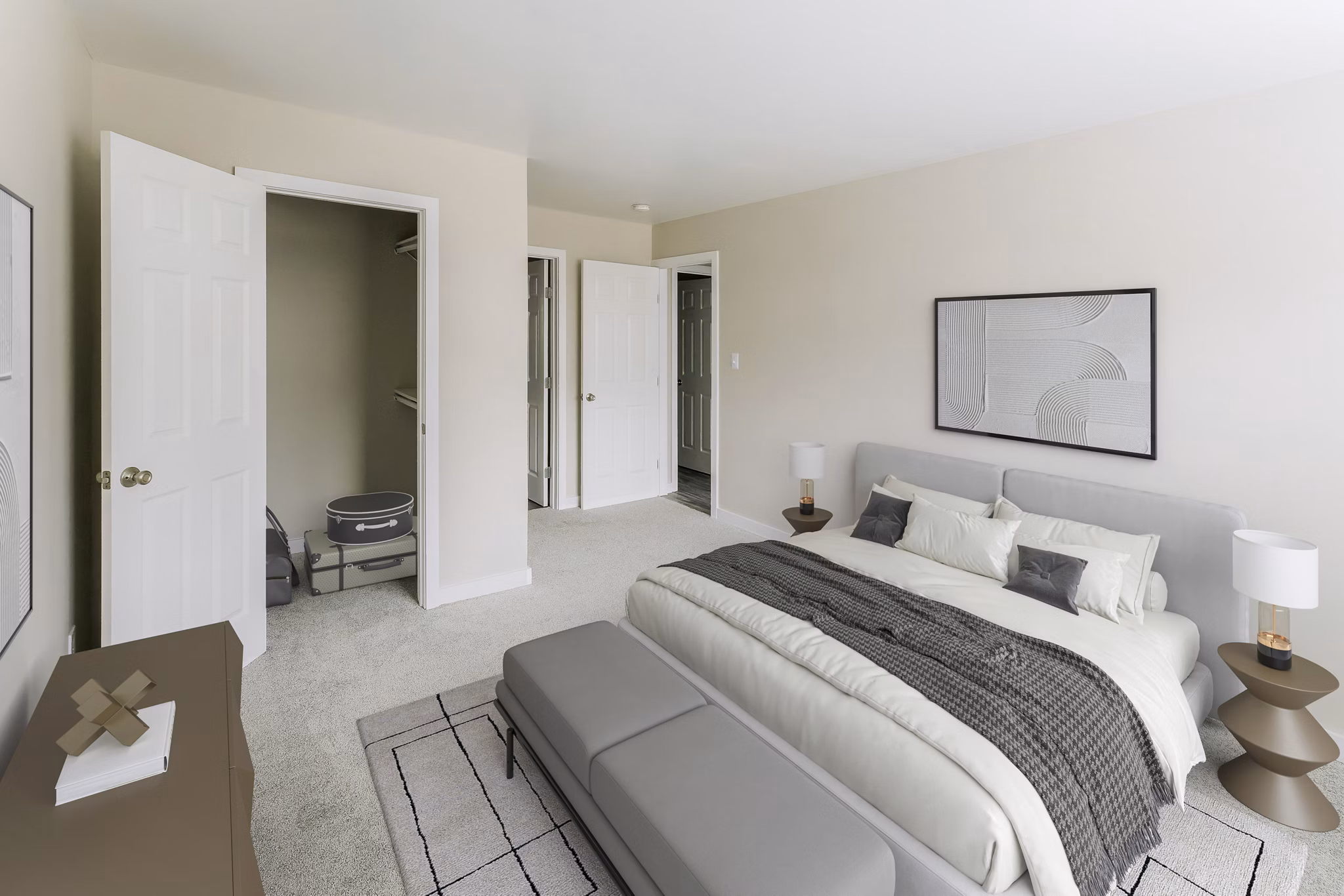 Cozy bedroom with modern furnishings at Sun River Village Apartments, luxury residences by Greystar