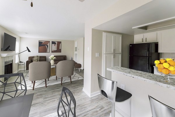 Elegant dining room with modern furnishings in Sun River Village Apartments Ideal for hosting gatherings in style