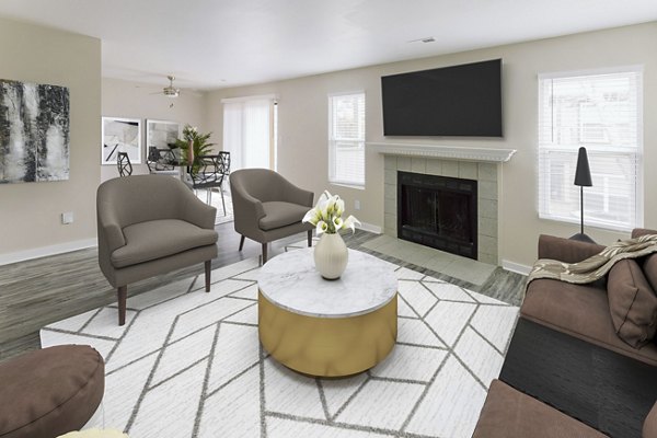 Cozy living room with elegant furnishings in Sun River Village Apartments