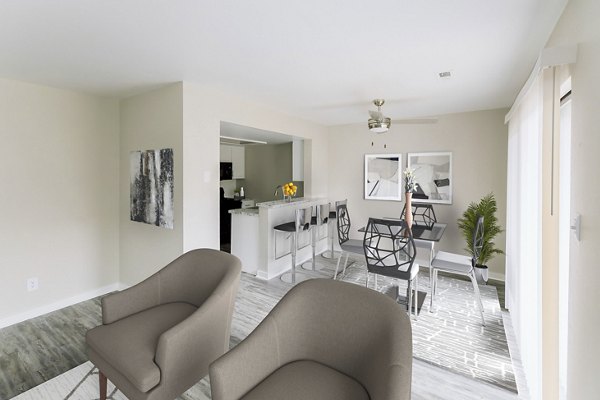 Spacious living room with modern decor at Sun River Village Apartments, offering comfort and style for luxury urban living