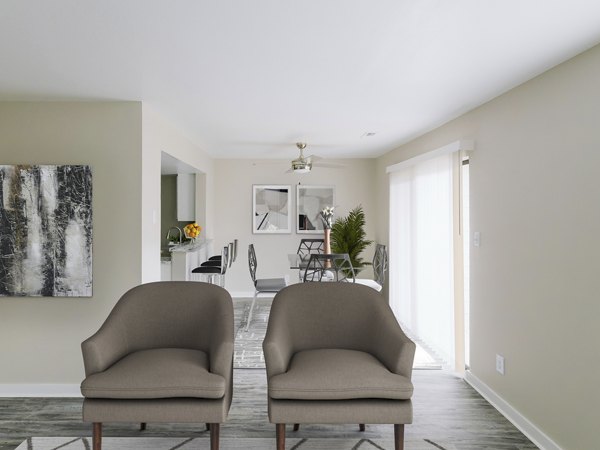 Spacious living room with modern decor in Sun River Village Apartments
