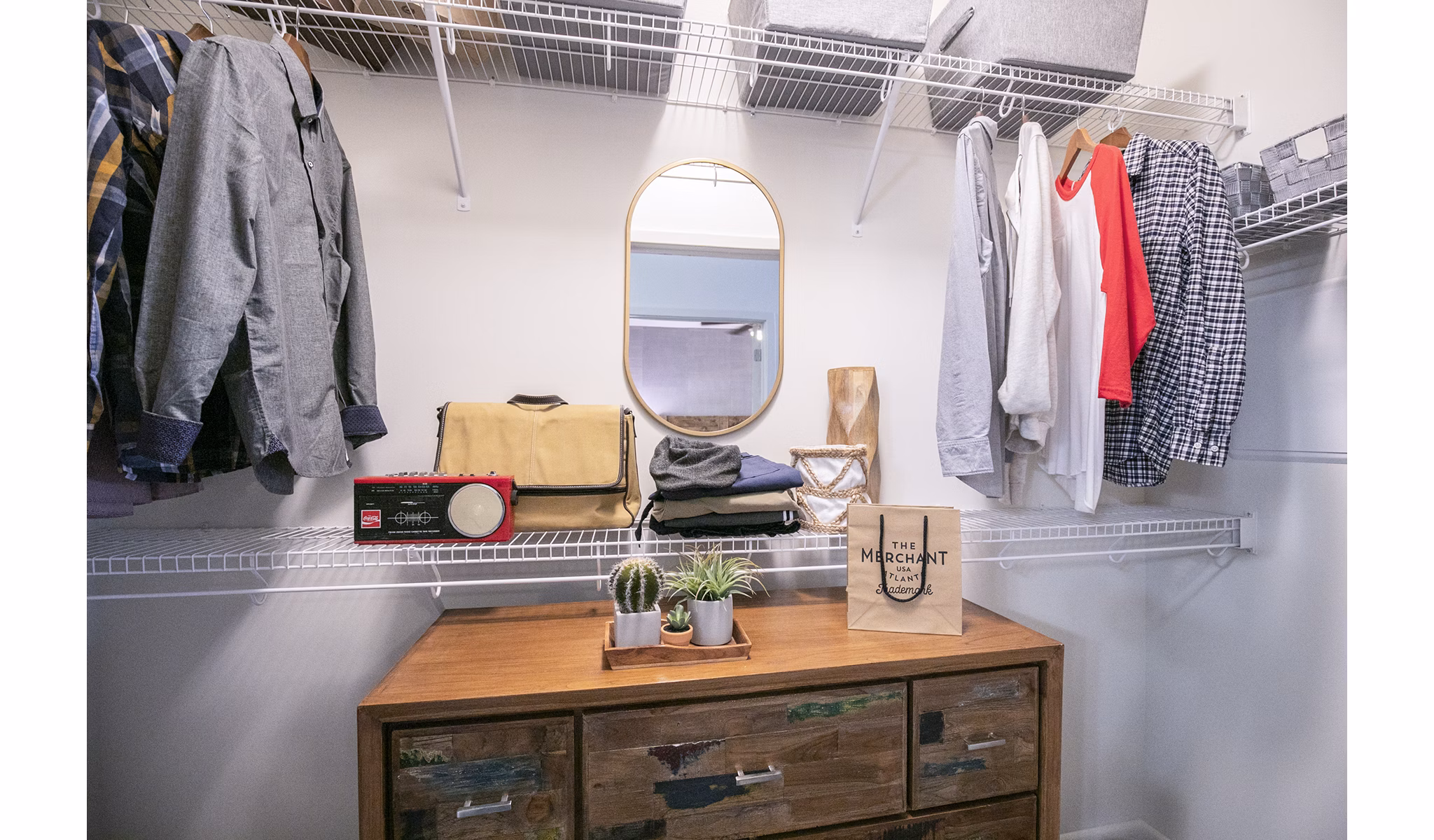 Spacious bedroom closet with organized shelving in Ayla Apartments