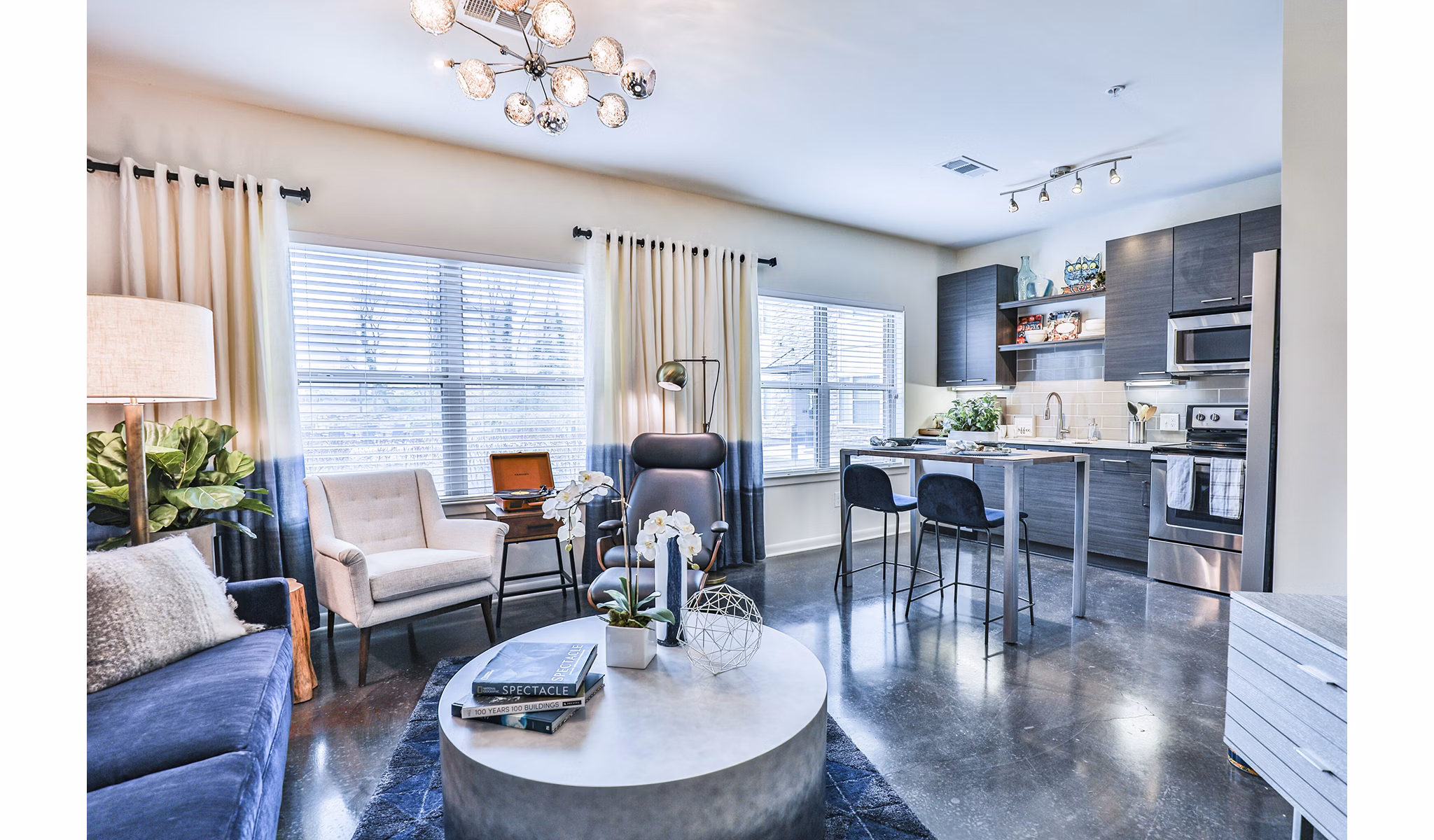 Contemporary living room with stylish furnishings at Ayla Apartments, Greystar luxury apartments