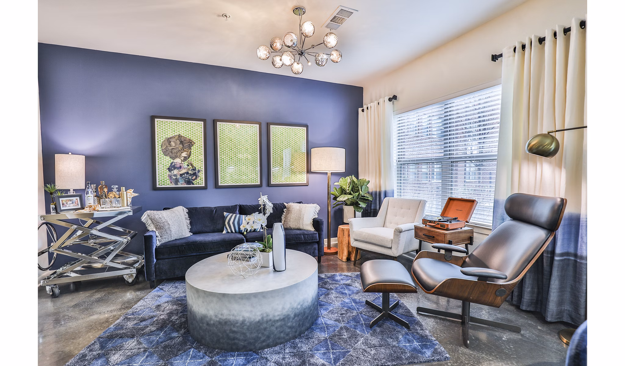 Spacious living room with modern furnishings at Ayla Apartments
