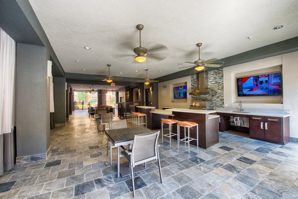 Clubhouse featuring modern design and social spaces at Domain West Apartments