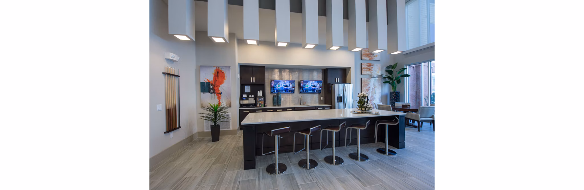 Clubhouse featuring modern lounge and entertainment area at Domain West Apartments in Houston