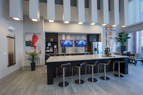Clubhouse featuring modern lounge and entertainment area at Domain West Apartments in Houston