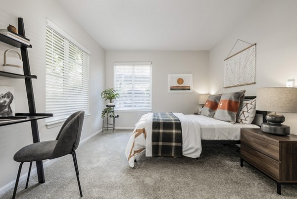 Bedroom with cozy home office space in Canyon Creek Apartments