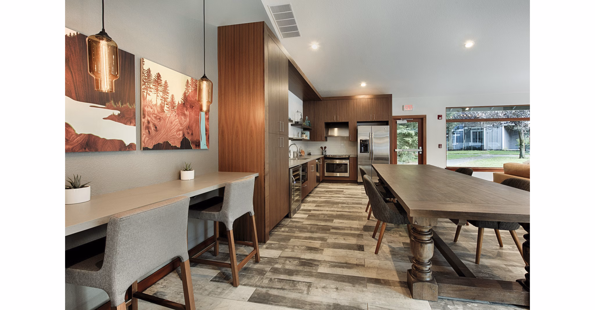 Clubhouse with modern seating and large windows at Canyon Creek Apartments, luxury living by Greystar
