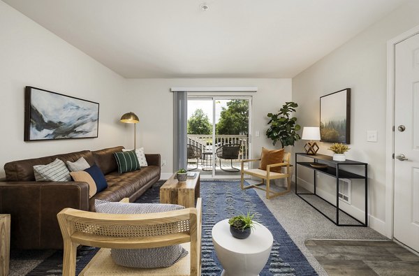 Outdoor pool with sun loungers at Canyon Creek Apartments