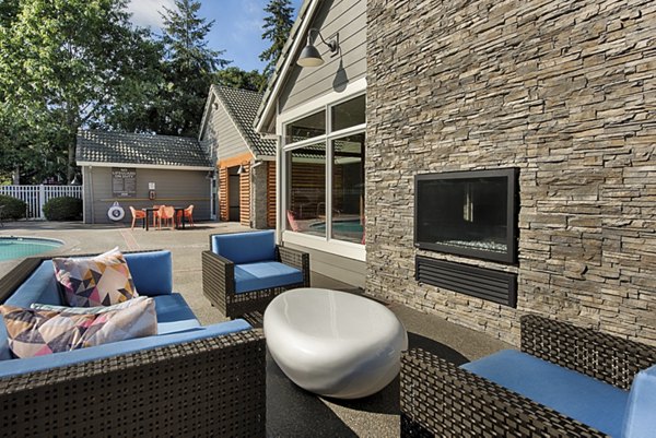 Canyon Creek Apartments: Elegant facade of luxury apartments in a serene park-like setting