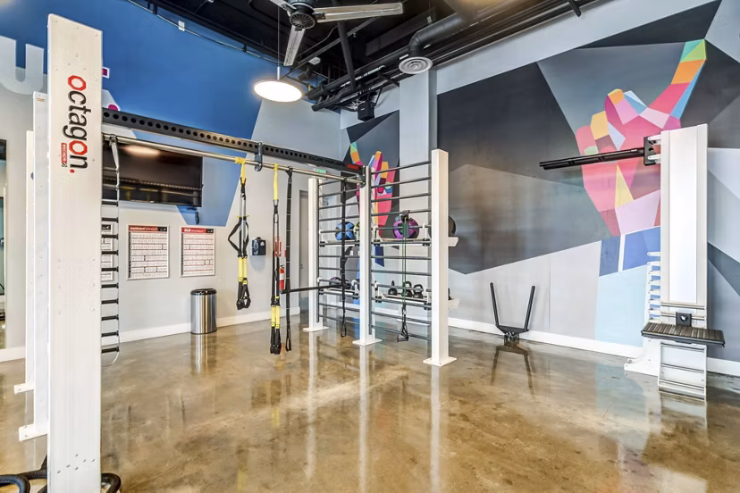 fitness center at The Mix at CTR City Apartments