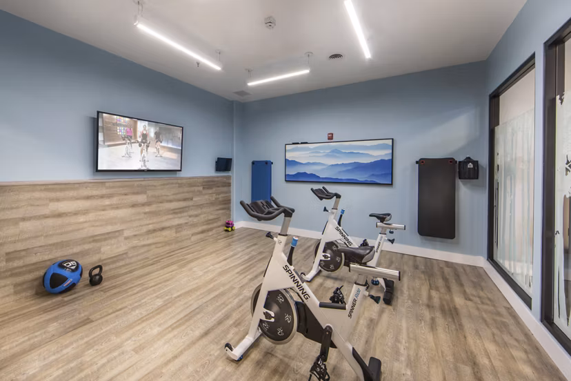 fitness center at The Mix at CTR City Apartments