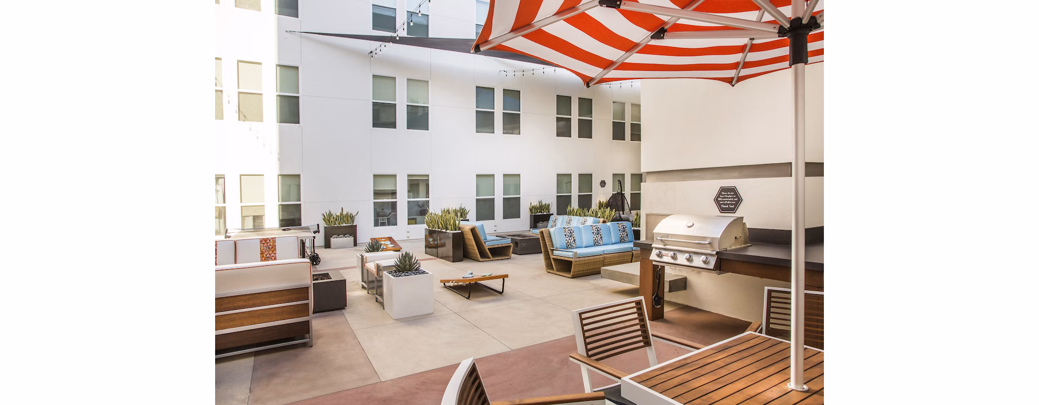 grill area at The Mix at CTR City Apartments