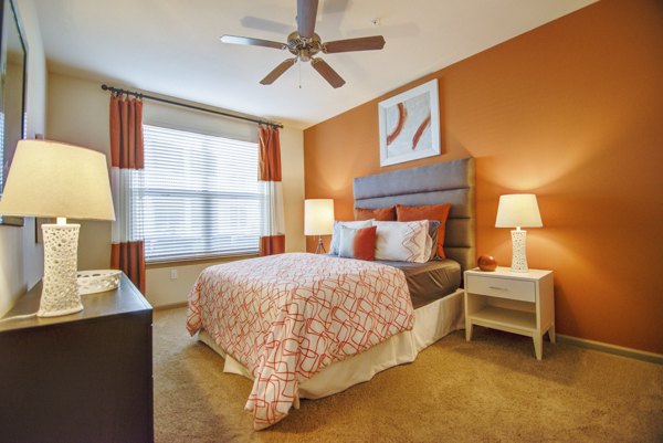 Cozy bedroom with modern decor at Capital Place Southwood Apartments