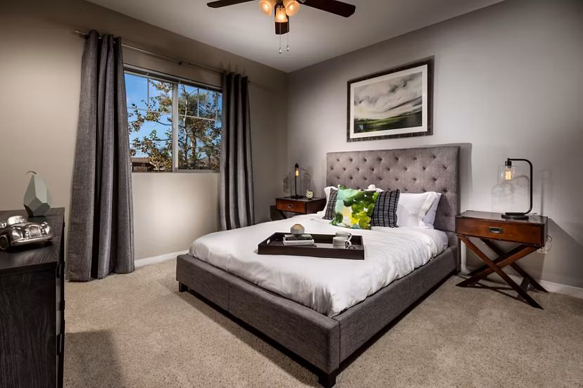 Cozy bedroom with modern decor in Montiavo Apartments