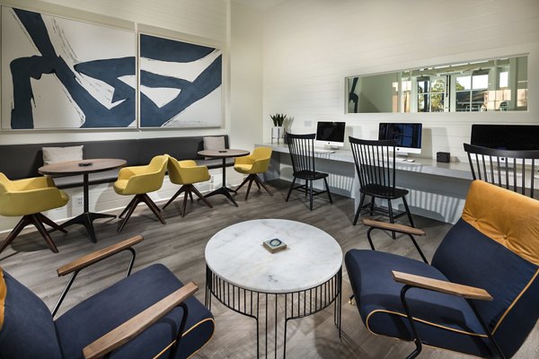 Clubhouse with sleek modern design at Montiavo Apartments, a luxury property offering diverse amenities in a vibrant community setting