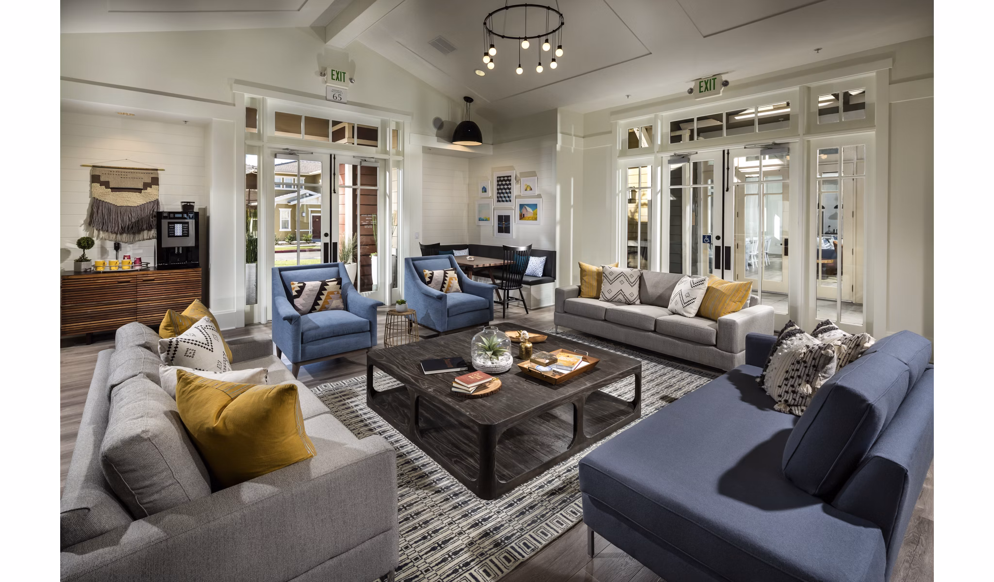 Clubhouse featuring modern design and comfortable seating at Montiavo Apartments, a Greystar luxury community
