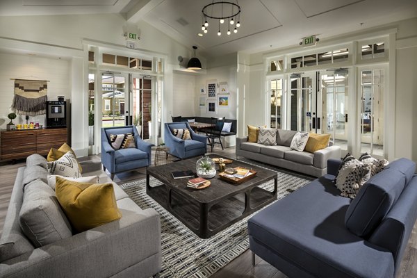 Clubhouse featuring modern design and comfortable seating at Montiavo Apartments, a Greystar luxury community