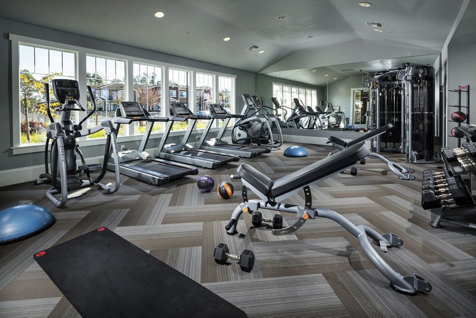 Modern fitness center featuring top-of-the-line equipment at Montiavo Apartments