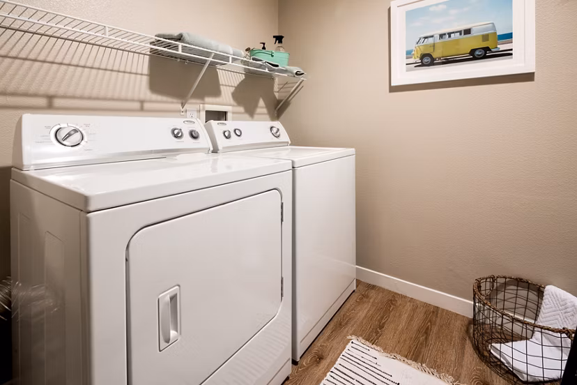 Efficiency-focused laundry room with energy-saving washers and dryers in Montiavo Apartments