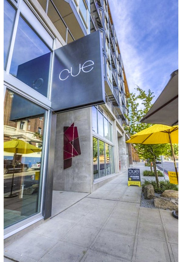 building/exterior/signage at Cue Apartments