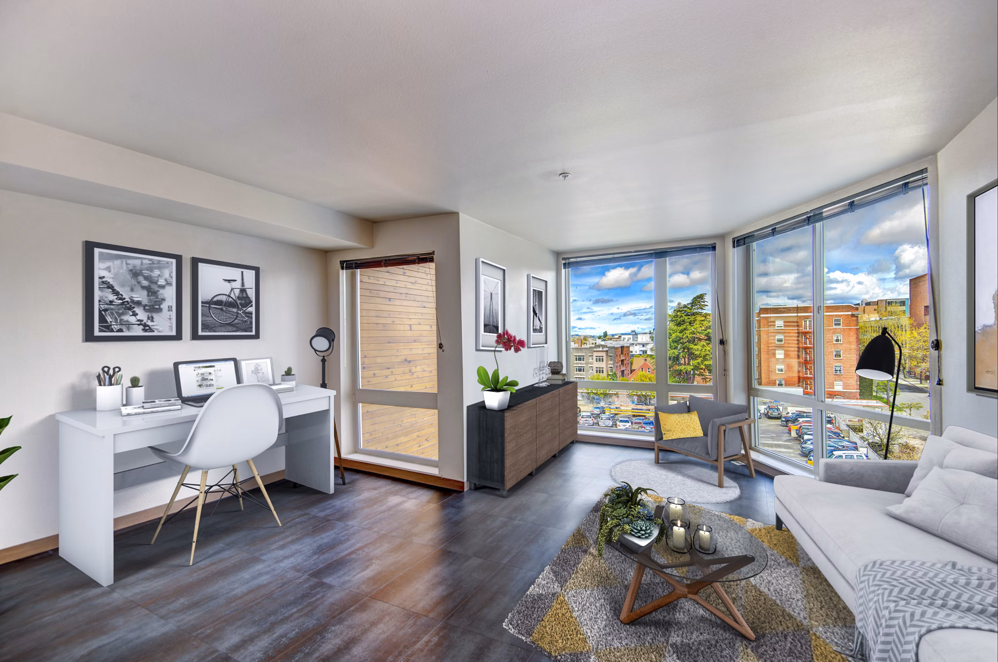Modern home office and living room with stylish decor at Cue Apartments