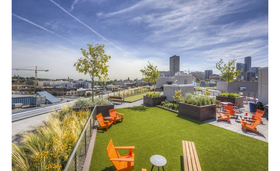 Spacious patio balcony with city view at Cue Apartments