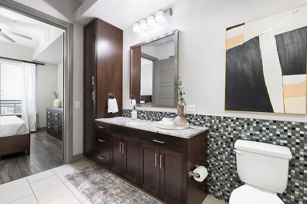 Luxurious bathroom with modern fixtures at The Kenzie at The Domain Apartments