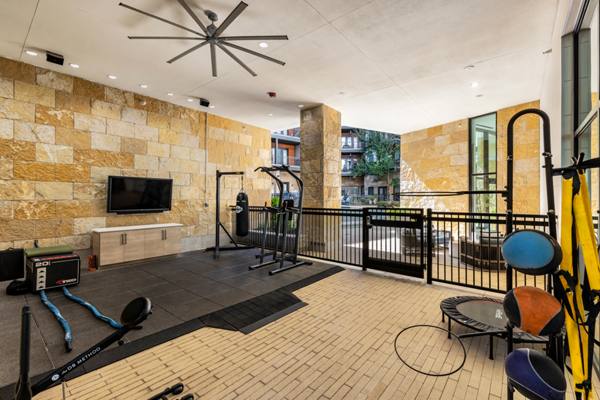 fitness center at The Kenzie at the Domain Apartments