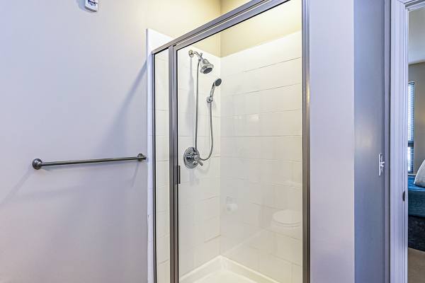 bathroom shower at Album Quail Springs Apartments
