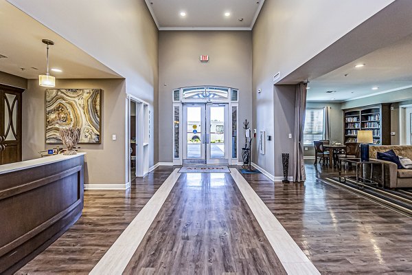 Elegant clubhouse lobby featuring modern decor and cozy seating at Album Quail Springs luxury apartments