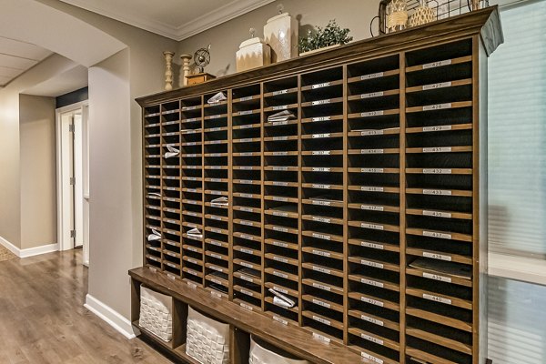 Newspaper subscription pickup station at Album Quail Springs Apartments